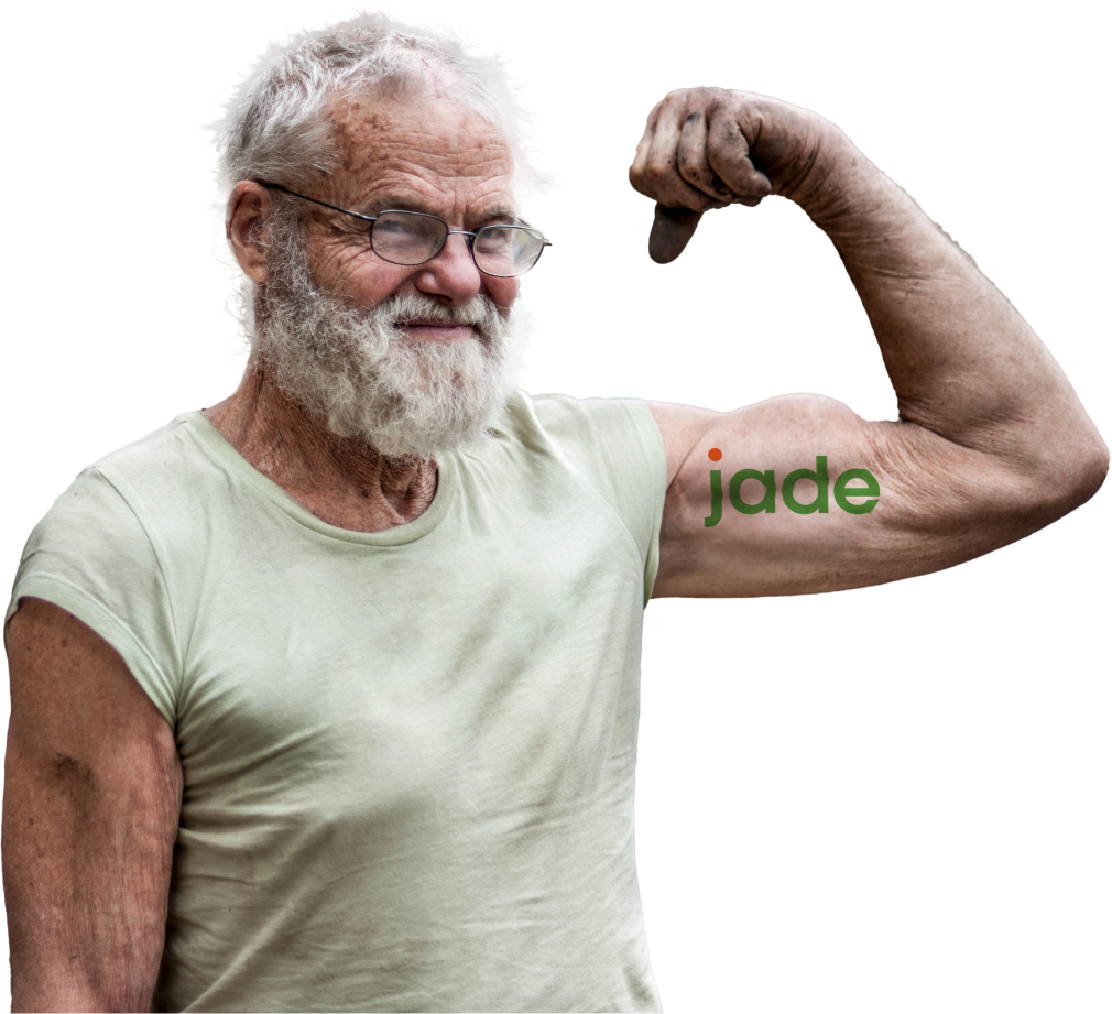 An elderly man flexing his considerable muscles with the Prime Connect logo tattooed on his arm\.