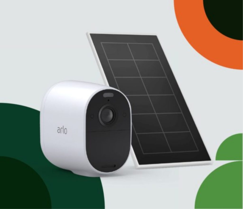 A security camera with a solar panel behind it\.